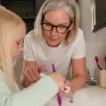 Salute dentale in famiglia: come dare il buon esempio ai figli